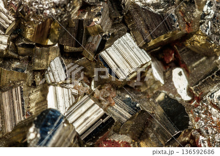 Macro mineral stone Pyrite on a black background 136592686