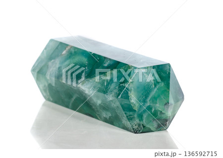Macro mineral stone Fluorite crystal on a black background 136592715