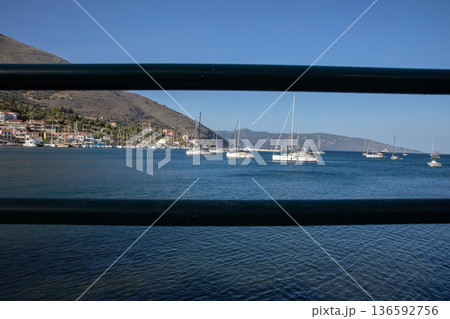 AGIA EFIMIA PORT, KEFALONIA ISLAND - JULY 27, 2025: Picturesque view of Agia Efimia marina, Kefalonia island, Ionian Sea, Greece. 136592756