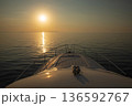 Traveling by sea on a yacht early in the summer morning, Ionian Sea, Greece. Horizontal. 136592767