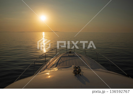 Traveling by sea on a yacht early in the summer morning, Ionian Sea, Greece. Horizontal. Traveling by sea on a yacht early in the summer morning, Ionian Sea, Greece. Horizontal. 136592767