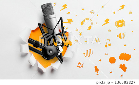 Podcast microphone breaks through wall with sound icons and symbols flying around it Podcast microphone breaks through wall with sound icons and symbols flying around it 136592827