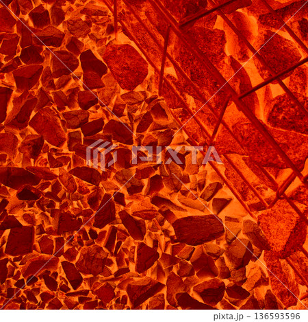 Textured image of red hot pieces of ore bearing rocks in furnace. Photo that illustrates the process of smelting metals from ore Textured image of red hot pieces of ore bearing rocks in furnace. Photo that illustrates the process of smelting metals from ore 136593596