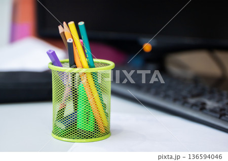 An artistic and structured study area showcasing colorful pencils and modern minimal decor An artistic and structured study area showcasing colorful pencils and modern minimal decor 136594046