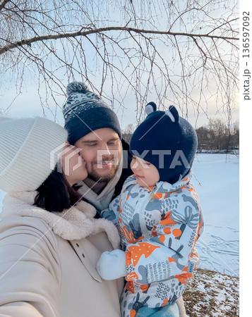 Happy Family Enjoying a Winter Day Happy Family Enjoying a Winter Day 136597092