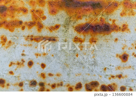 Close-up of rust patterns on weathered metal surface Close-up of rust patterns on weathered metal surface 136600884