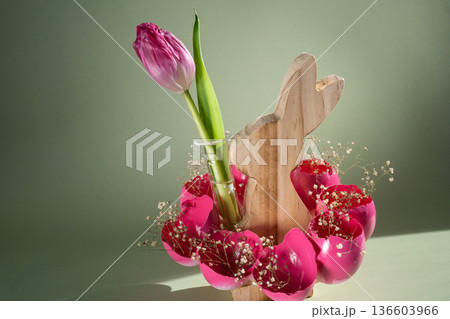 Self made vibrant pink egg shell with wooden bunny vase handmade decoration for Easter holiday. Copy space greeting card present gift ideas. Tulip flower Creative reuse zero waste sustainable living Self made vibrant pink egg shell with wooden bunny vase handmade decoration for Easter holiday. Copy space greeting card present gift ideas. Tulip flower Creative reuse zero waste sustainable living 136603966
