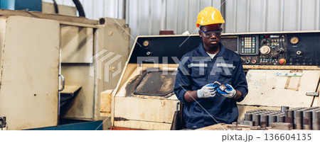 Workers Factory or Engineering work at factory site check up machine or products in site. Workers Factory or Engineering work at factory site check up machine or products in site. 136604135