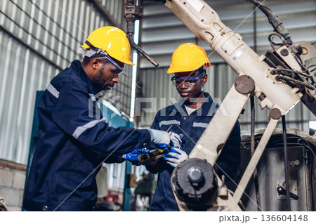Workers Factory or Engineering work at factory site check up machine or products in site. Workers Factory or Engineering work at factory site check up machine or products in site. 136604148