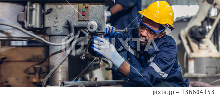 Workers Factory or Engineering work at factory site check up machine or products in site. 136604153