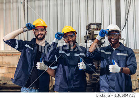 Team Workers Factory or Team Engineering work at factory site check up machine or products in site. Team Workers Factory or Team Engineering work at factory site check up machine or products in site. 136604715