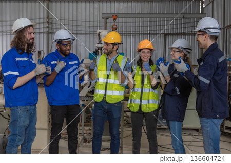 Team Workers Factory or Team Engineering work at factory site check up machine or products in site. Team Workers Factory or Team Engineering work at factory site check up machine or products in site. 136604724