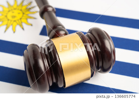 Uruguay flag with judge hammer, Law and justice court. 136605774