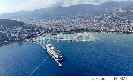 Cruise ship docks in resort town. picturesque seaport 136608212