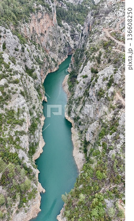 River winding valley. Reservoir in the mountains with turquoise water River winding valley. Reservoir in the mountains with turquoise water 136608250