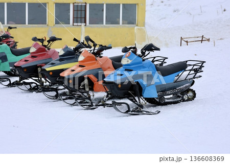 Snowmobiles winter landscape Snowy snowmobile solitude. High quality photo 136608369