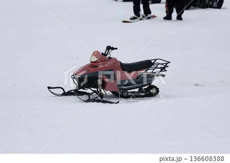 Snowy snowmobile solitude. High quality photo 136608388
