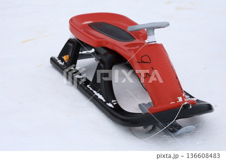 Person pulling sled. High quality photo 136608483