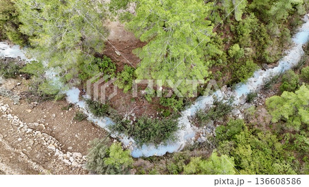 stream in the mountains against the backdrop of nature spring in the mountains against the backdrop of nature. High quality photo 136608586