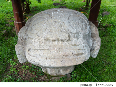 Stone sculpture of a birthing woman at Te Lipona, Hiva Oa, French Polynesia 136608885