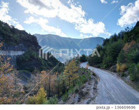 Mountainous road sky. Cloudy road landscape. High quality photo 136609696