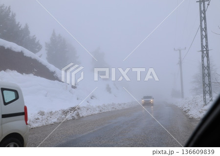Foggy snowy road. High quality photo 136609839
