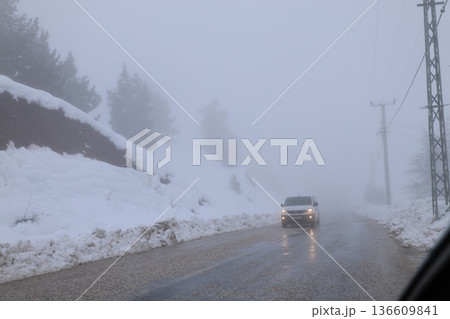 Foggy snowy road. High quality photo 136609841