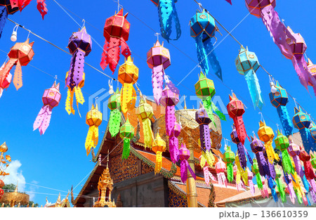 Beautiful traditional oriental lantern decoration in Wat Phra That Doi Suthep, Chiang Mai, Thailand. Colorful paper lantern in buddhist temple, Chiangmai. Topic of vacation, travel, trip, cruise, tour Beautiful traditional oriental lantern decoration in Wat Phra That Doi Suthep, Chiang Mai, Thailand. Colorful paper lantern in buddhist temple, Chiangmai. Topic of vacation, travel, trip, cruise, tour 136610359