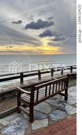 Sunset ocean bench. High quality photo Sunset ocean bench. High quality photo 136610420