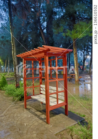 Green bench rain. High quality photo 136610502