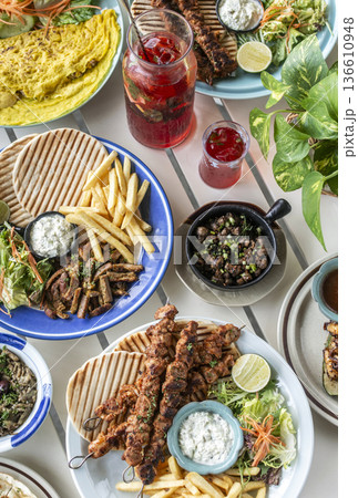 many different mediterranean food dishes on restaurant table in greece many different mediterranean food dishes on restaurant table in greece 136610948