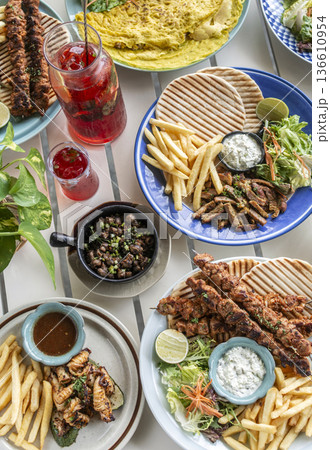 many different mediterranean food dishes on restaurant table in greece many different mediterranean food dishes on restaurant table in greece 136610954