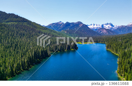 Landscape of mountain and forest of Cooper lake. Nature landscape. Cooper Lake in Washington. Scenic nature of popular hiking Cooper lake. Cooper lake with mountain landscape. Pristine nature Landscape of mountain and forest of Cooper lake. Nature landscape. Cooper Lake in Washington. Scenic nature of popular hiking Cooper lake. Cooper lake with mountain landscape. Pristine nature 136611088