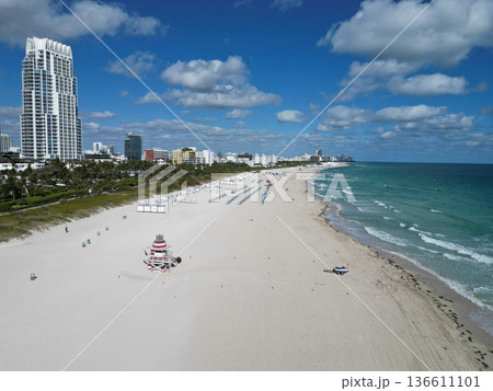 Miami south beach. Travel to sea. Aerial top view of sand beach with turquoise water. Luxury resort. Enjoying beach sun. Summer vacation. Beach vacation at sea in summer. Sea relax at seashore Miami south beach. Travel to sea. Aerial top view of sand beach with turquoise water. Luxury resort. Enjoying beach sun. Summer vacation. Beach vacation at sea in summer. Sea relax at seashore 136611101