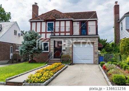 House exterior architecture. Housing in neighborhood. Private house architecture. Private housing property. Residential suburban house. Suburban home in private residential housing 136611256