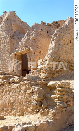 Ruined Doorway Conceals Secrets Inside. Lost Structure Hides Stories Beneath Sand Layers. Weathered Entrance Invites Explorers To Uncover Ancient Mysteries Buried Underground Ruined Doorway Conceals Secrets Inside. Lost Structure Hides Stories Beneath Sand Layers. Weathered Entrance Invites Explorers To Uncover Ancient Mysteries Buried Underground 136613702