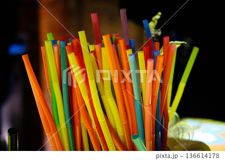 Colorful Plastic Drinking Straws in Bar Setting Colorful Plastic Drinking Straws in Bar Setting 136614178