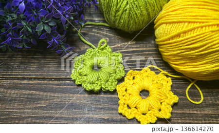 Knitted flowers and circles suitable for home decor, fashion, or textiles. 136614270