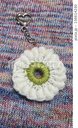 Knitted flowers and circles suitable for home decor, fashion, or textiles. 136614280