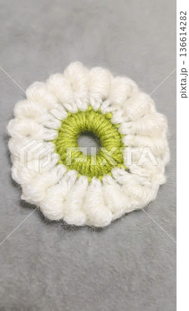 Knitted flowers and circles suitable for home decor, fashion, or textiles. Knitted flowers and circles suitable for home decor, fashion, or textiles. 136614282