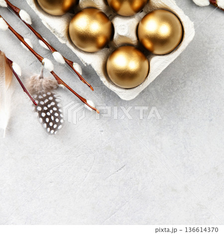 Golden Easter Eggs with Willow Branches on Light Background Golden Easter Eggs with Willow Branches on Light Background 136614370