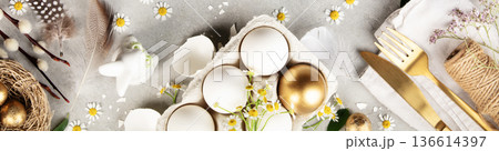 Easter Flat Lay with Golden Egg, Daisies and Bunny Decor 136614397