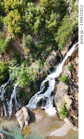 Cascading rocky waterfall. High quality photo 136615812