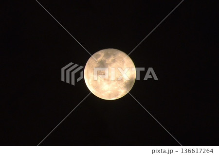 full moon covering by cloud floating on sky in night background 136617264