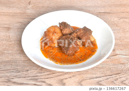 beef curry or Mussamun Indian food with slice potato on plate 136617267
