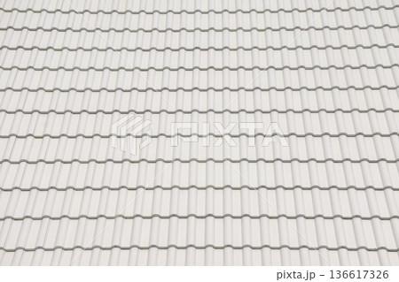 white tile rooftop of building background and texture in sunny day white tile rooftop of building background and texture in sunny day 136617326