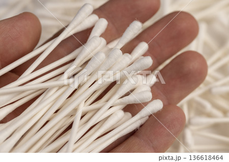 cotton swabs with natural cotton for hygiene and cosmetics, white natural sticks with natural white cotton for makeup correction , injury treatment 136618464