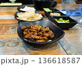Traditional Korean Street Food Beondegi Boiled Silkworm Pupae in a Black Bowl 136618587