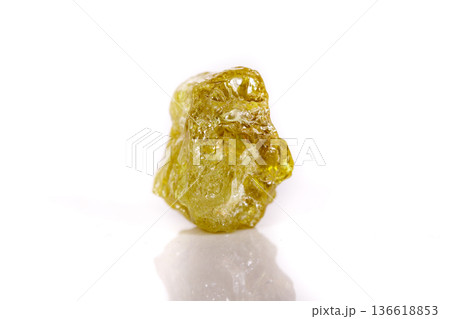Macro mineral stone Green pomegranate on white background Macro mineral stone Green pomegranate on white background 136618853