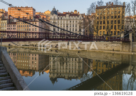 Bridge over the river in Lyon with building reflections on the water 136619128